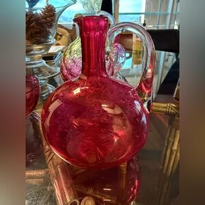 Antique Victorian cranberry glass decanter jug with a clear applied handle